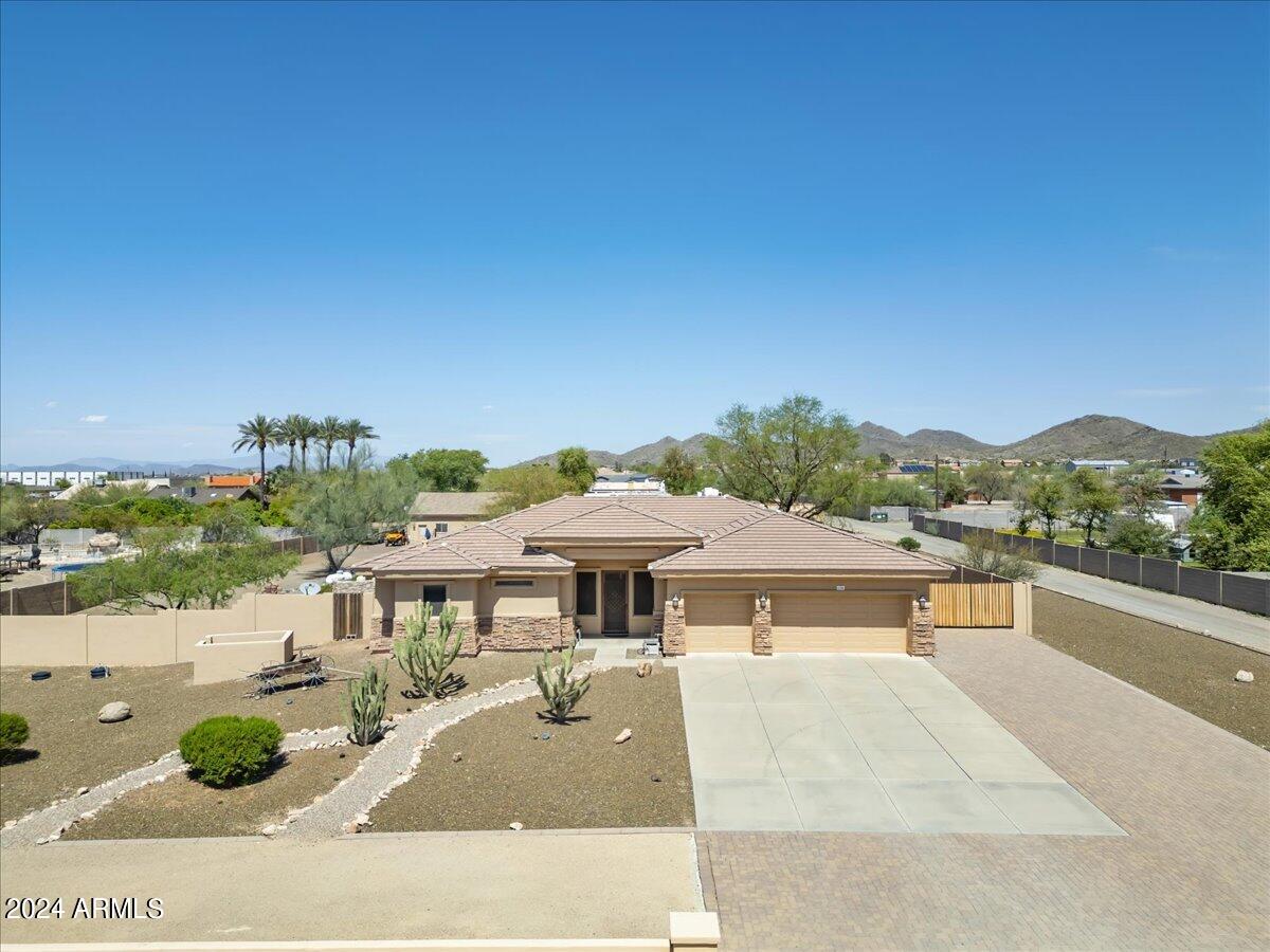 1706 West Parsons Road Phoenix, AZ 85085 - Photo 2 of 58 a view of a patio with swimming pool
