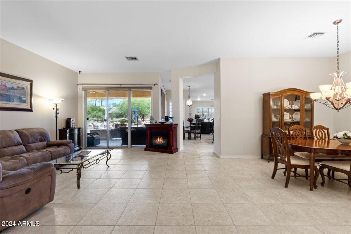1706 West Parsons Road Phoenix, AZ 85085 - Photo 21 of 58 a living room with furniture and a large window