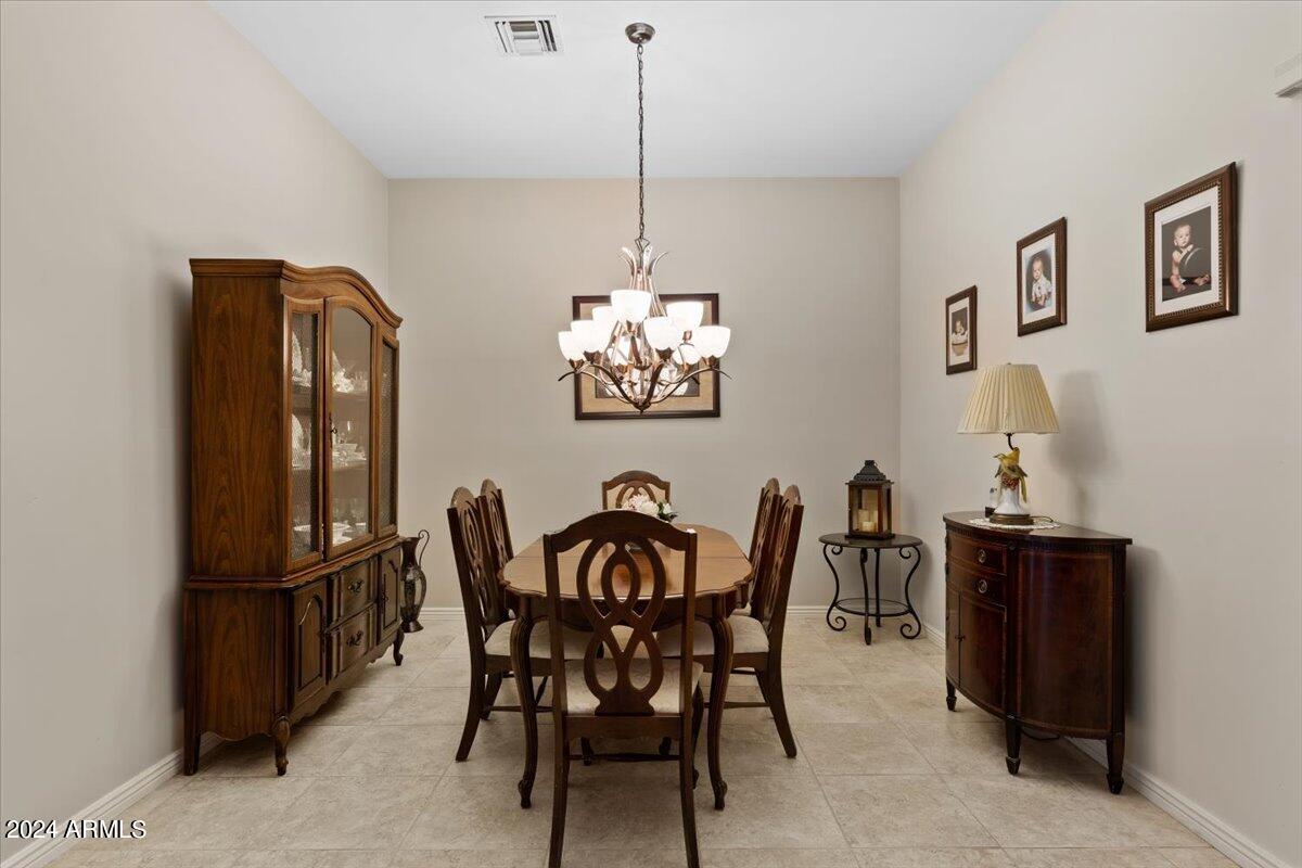 1706 West Parsons Road Phoenix, AZ 85085 - Photo 22 of 58 a view of a dining room with furniture