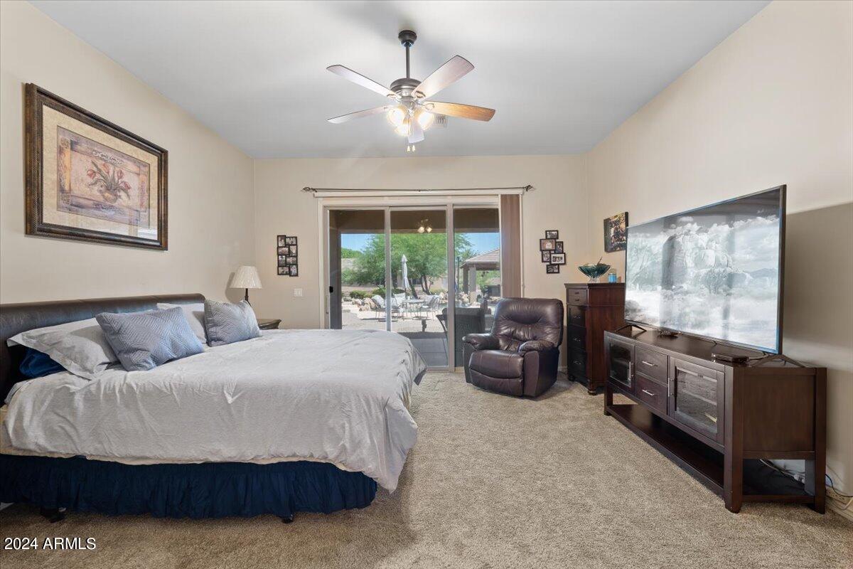 1706 West Parsons Road Phoenix, AZ 85085 - Photo 33 of 58 a living room with furniture and a large window