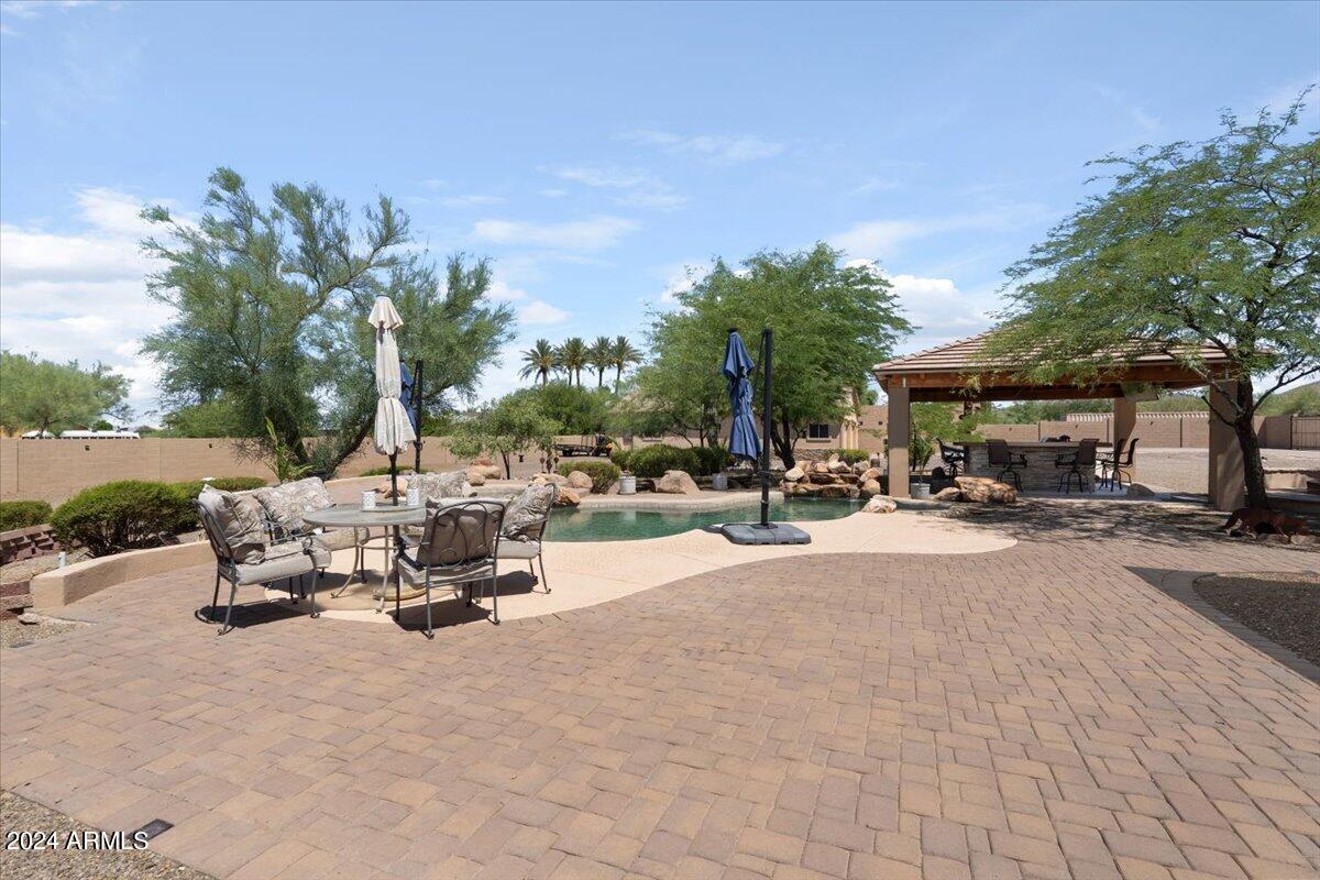 1706 West Parsons Road Phoenix, AZ 85085 - Photo 45 of 58 a view of a park with bench and trees