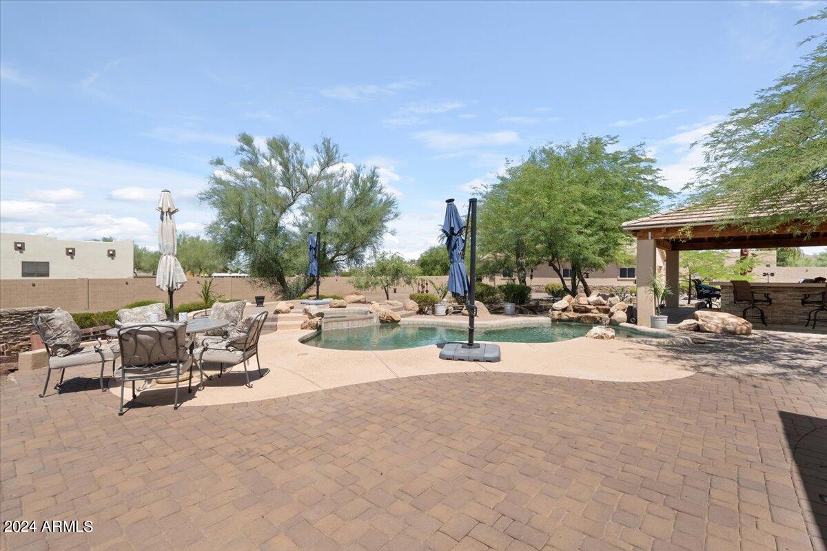1706 West Parsons Road Phoenix, AZ 85085 - Photo 46 of 58 a view of the patio and a fountain