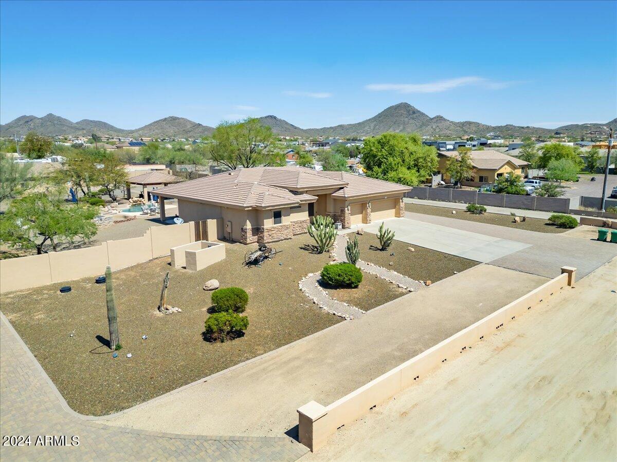 1706 West Parsons Road Phoenix, AZ 85085 - Photo 10 of 58 a view of a terrace with a table and chairs