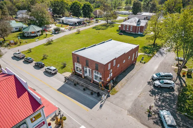 view of a swimming pool with lounge chairs