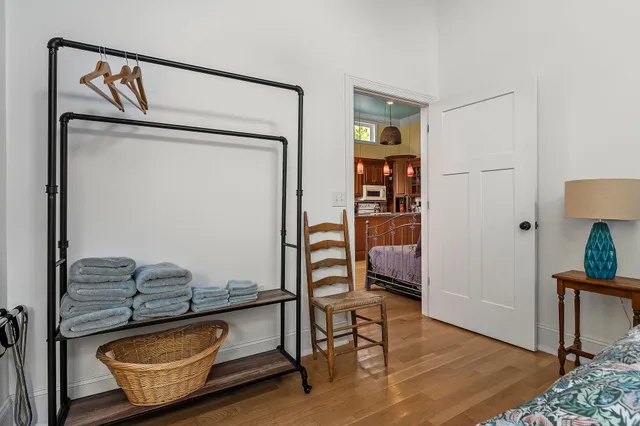 a living room with a couch and a window
