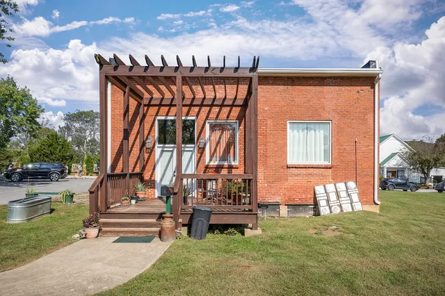 a garden view with a sitting space