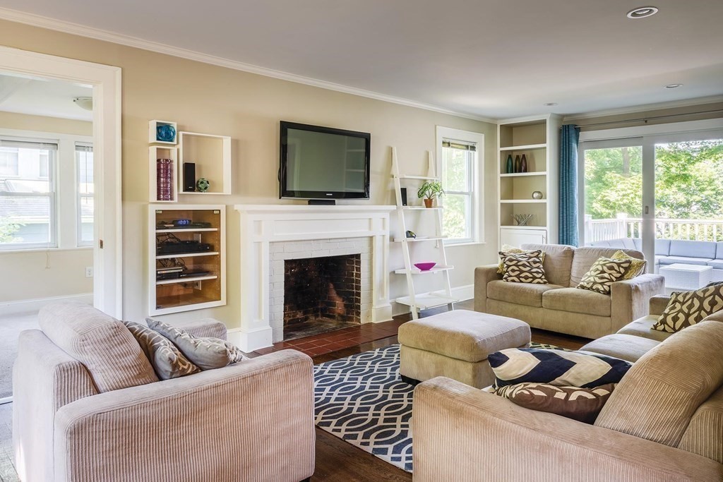 58 Pine Crest Road Newton, MA 02459 - Photo 2 of 17 a living room with furniture fireplace and flat screen tv