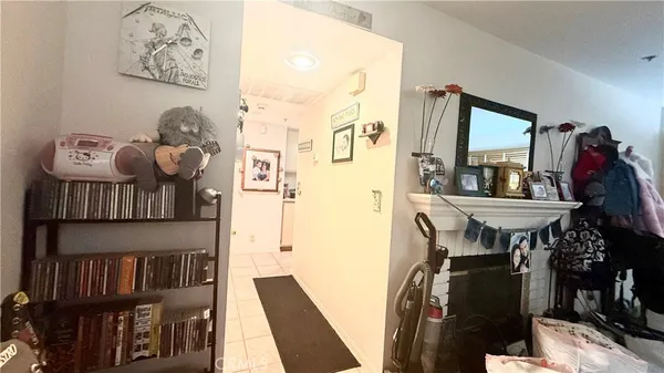 a view of living room with furniture and wooden floor