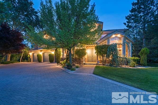 620 Meadowgate Court Reno, NV 89519 - Photo 1 of 1 a front view of a house with a yard and garage