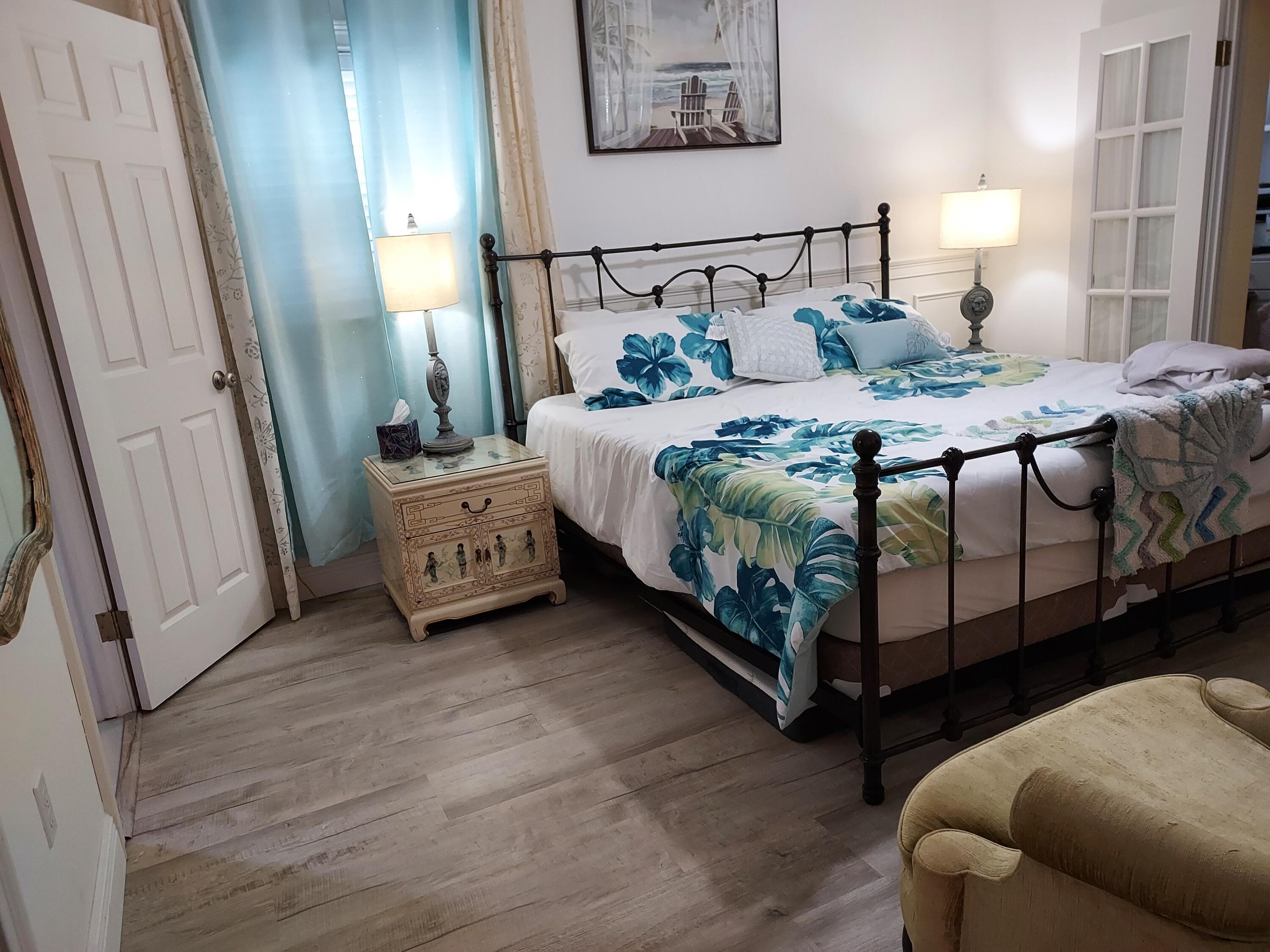 717 Highway 1, Unit 101 Jupiter, FL 33477 - Photo 11 of 27 Master King Bed