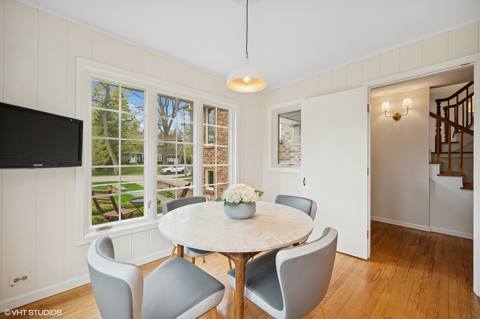 770 Prospect Avenue Winnetka, IL 60093 - Photo 15 of 50 a view of a dining room with furniture window and wooden floor