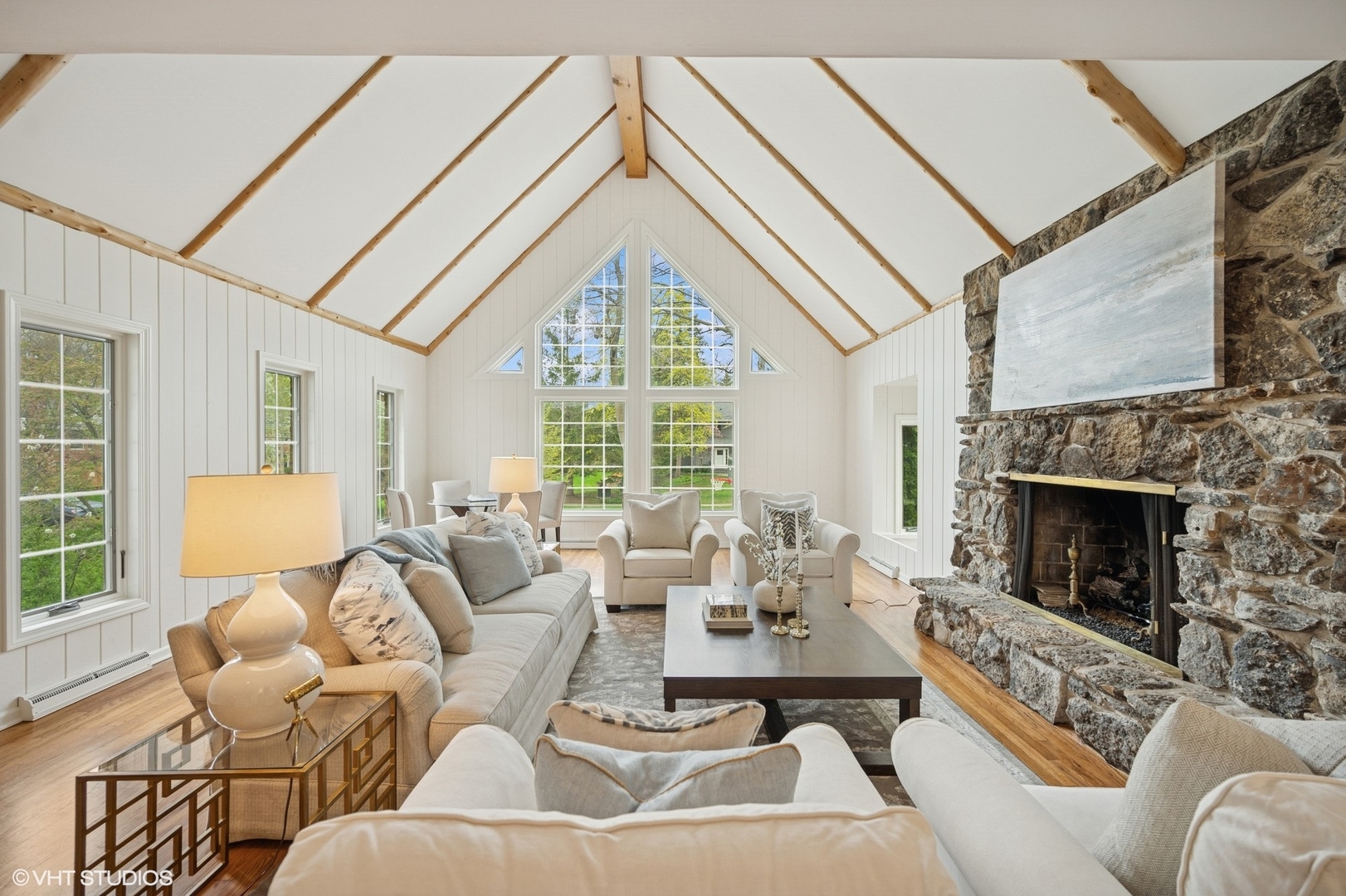 770 Prospect Avenue Winnetka, IL 60093 - Photo 19 of 50 a living room with furniture fireplace and a large window