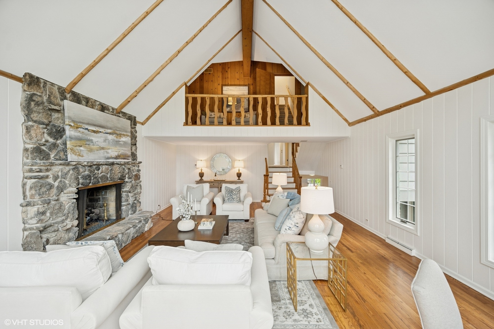 770 Prospect Avenue Winnetka, IL 60093 - Photo 21 of 50 a living room with furniture a fireplace and a flat screen tv