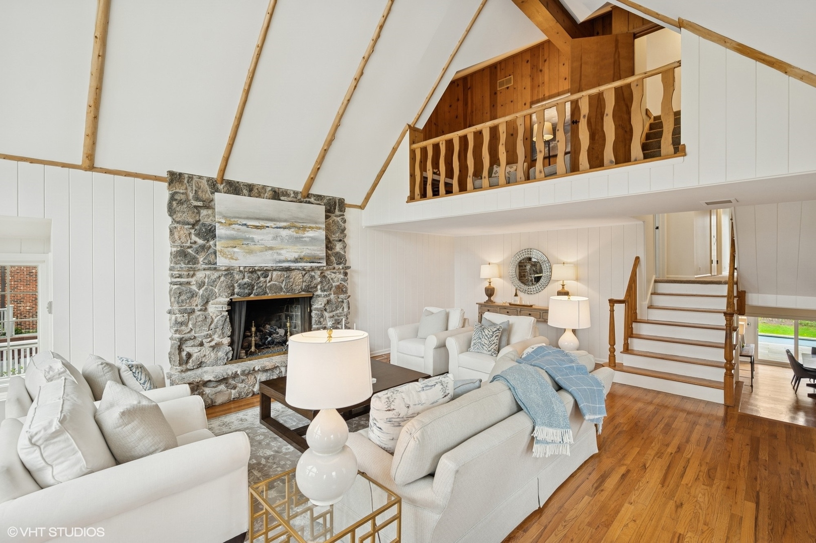 770 Prospect Avenue Winnetka, IL 60093 - Photo 22 of 50 a living room with furniture a fireplace and wooden floor