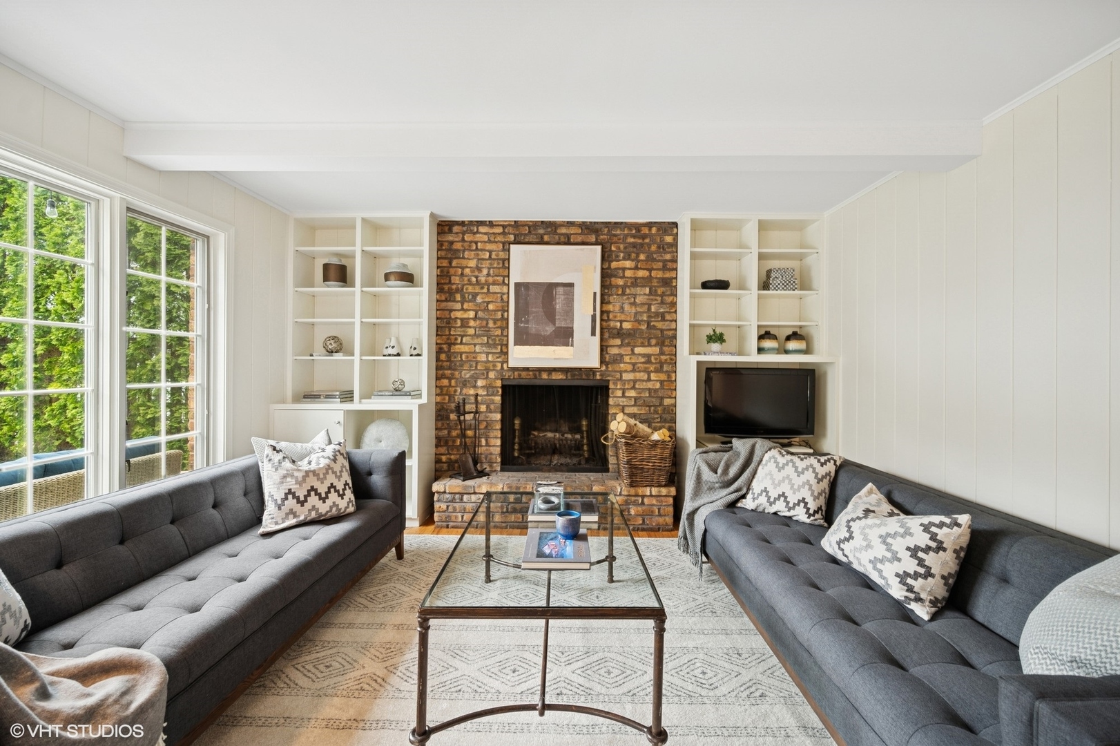 770 Prospect Avenue Winnetka, IL 60093 - Photo 7 of 50 a living room with furniture and a fireplace