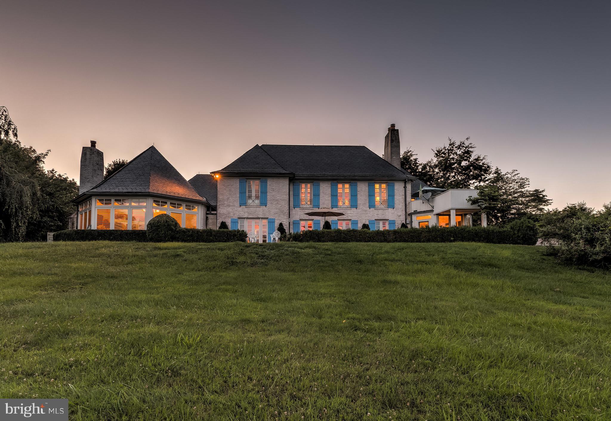 3801 Piney Grove Road Glyndon, MD 21136 - Photo 1 of 1 a front view of a house with a garden