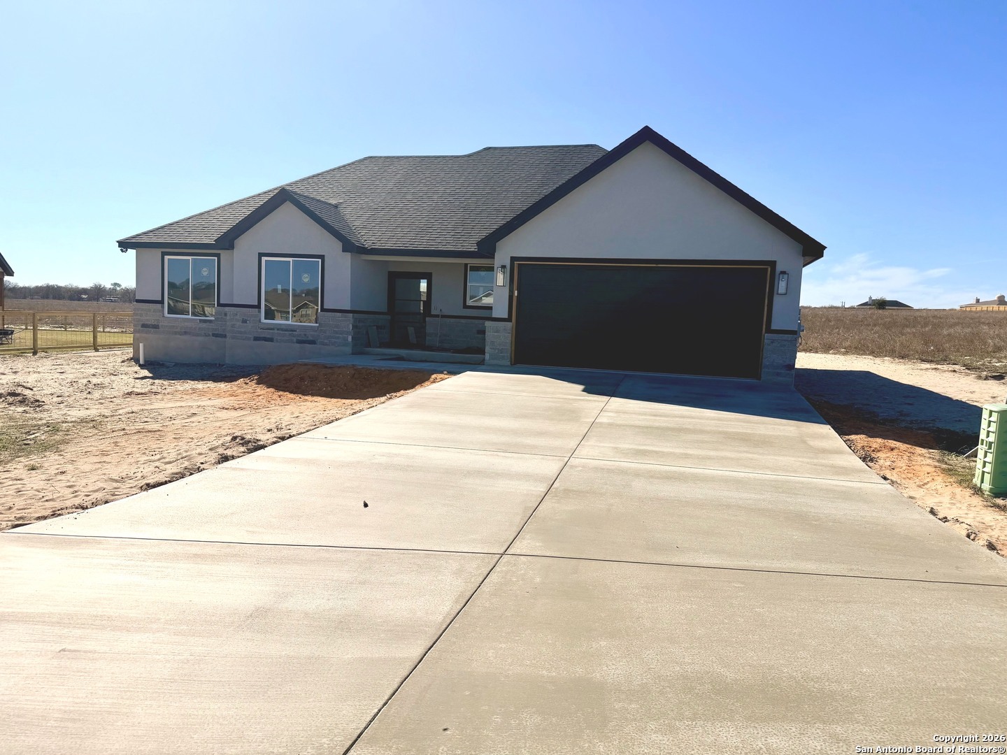 a front view of house with yard