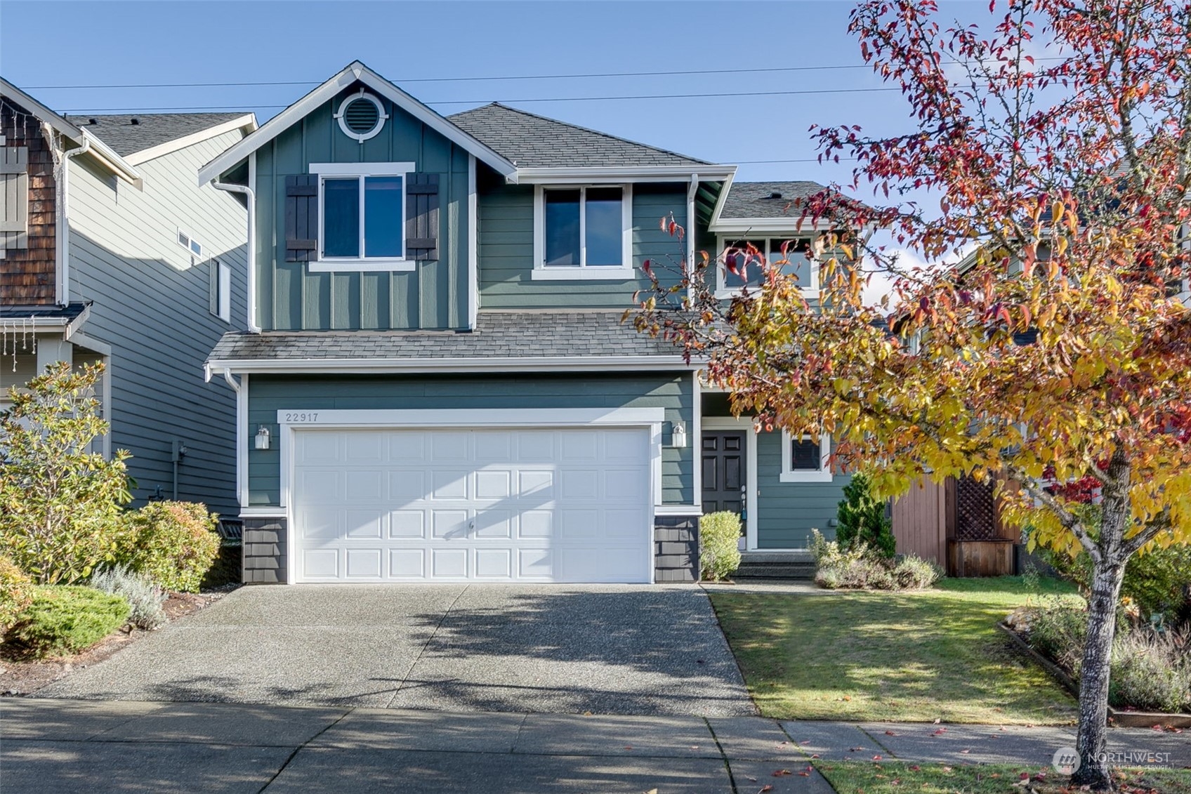 22917 42nd Drive Southeast Bothell, WA 98021 - Photo 1 of 36 a front view of a house with a yard