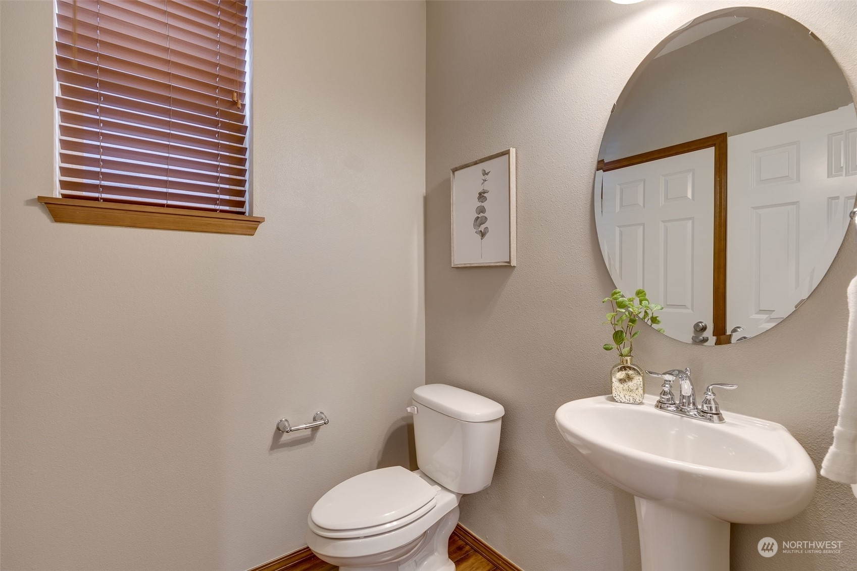 22917 42nd Drive Southeast Bothell, WA 98021 - Photo 12 of 36 a bathroom with a toilet sink and mirror