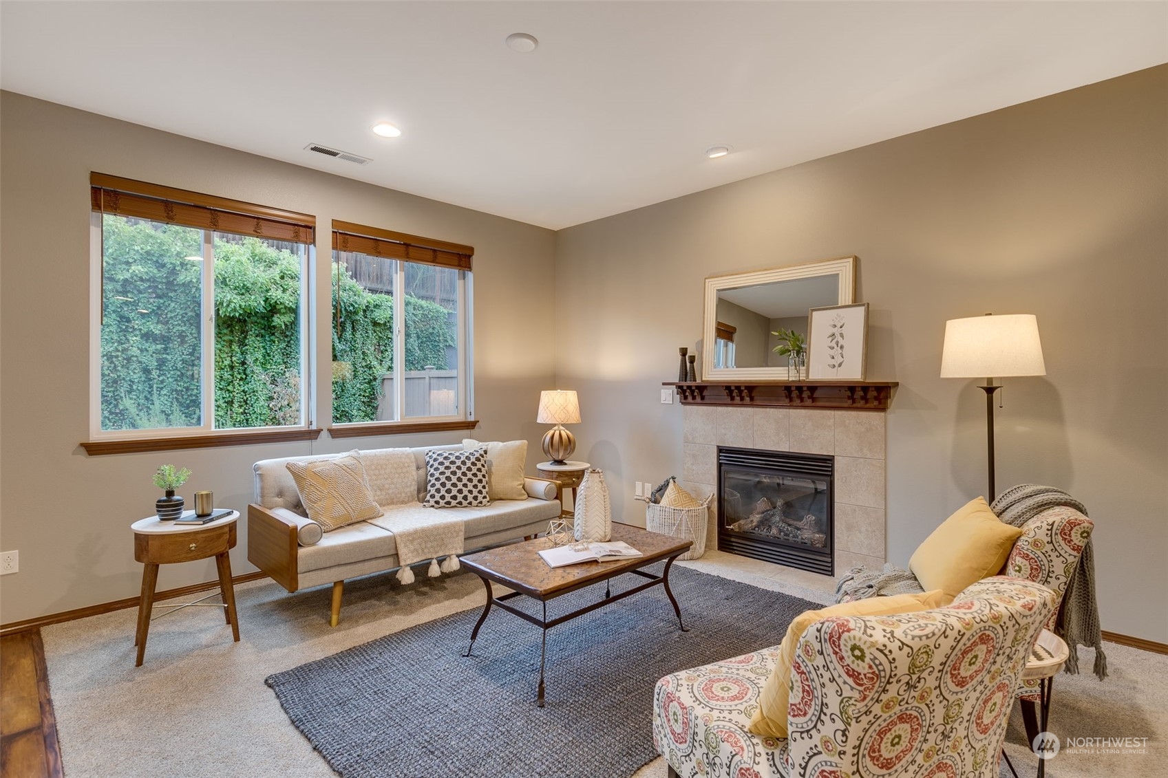 22917 42nd Drive Southeast Bothell, WA 98021 - Photo 8 of 36 a living room with furniture and a fireplace