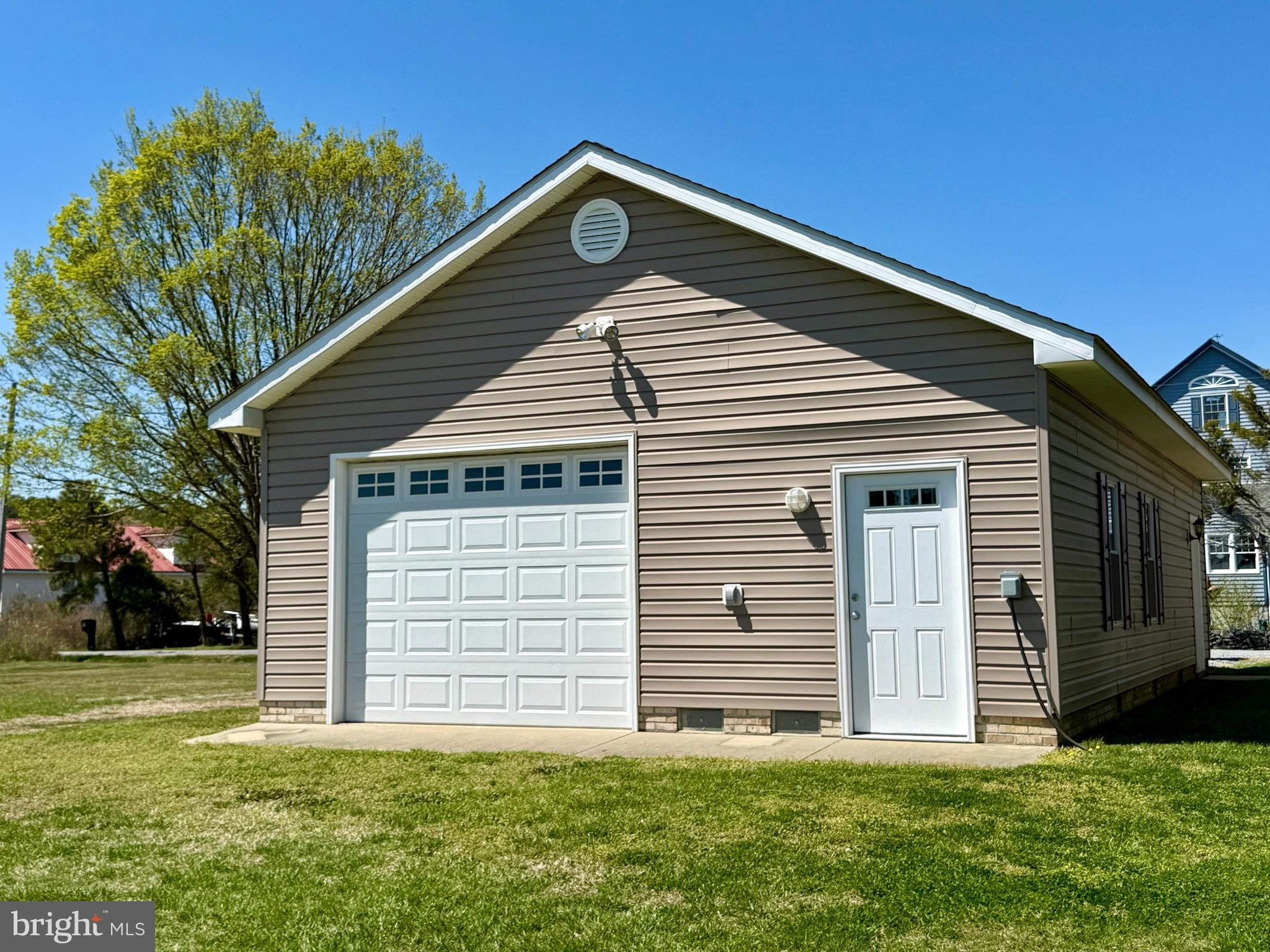 16460 Sayre Point Lane Piney Point, MD 20674 - Photo 43 of 61 a front view of a house with a yard