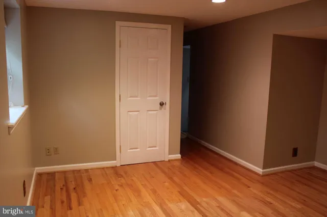 a view of small space with wooden floor