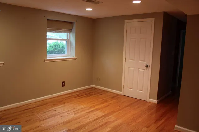 a utility room with closet dryer and washer