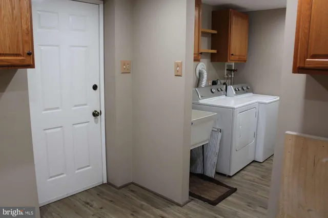 a bathroom with a sink and vanity