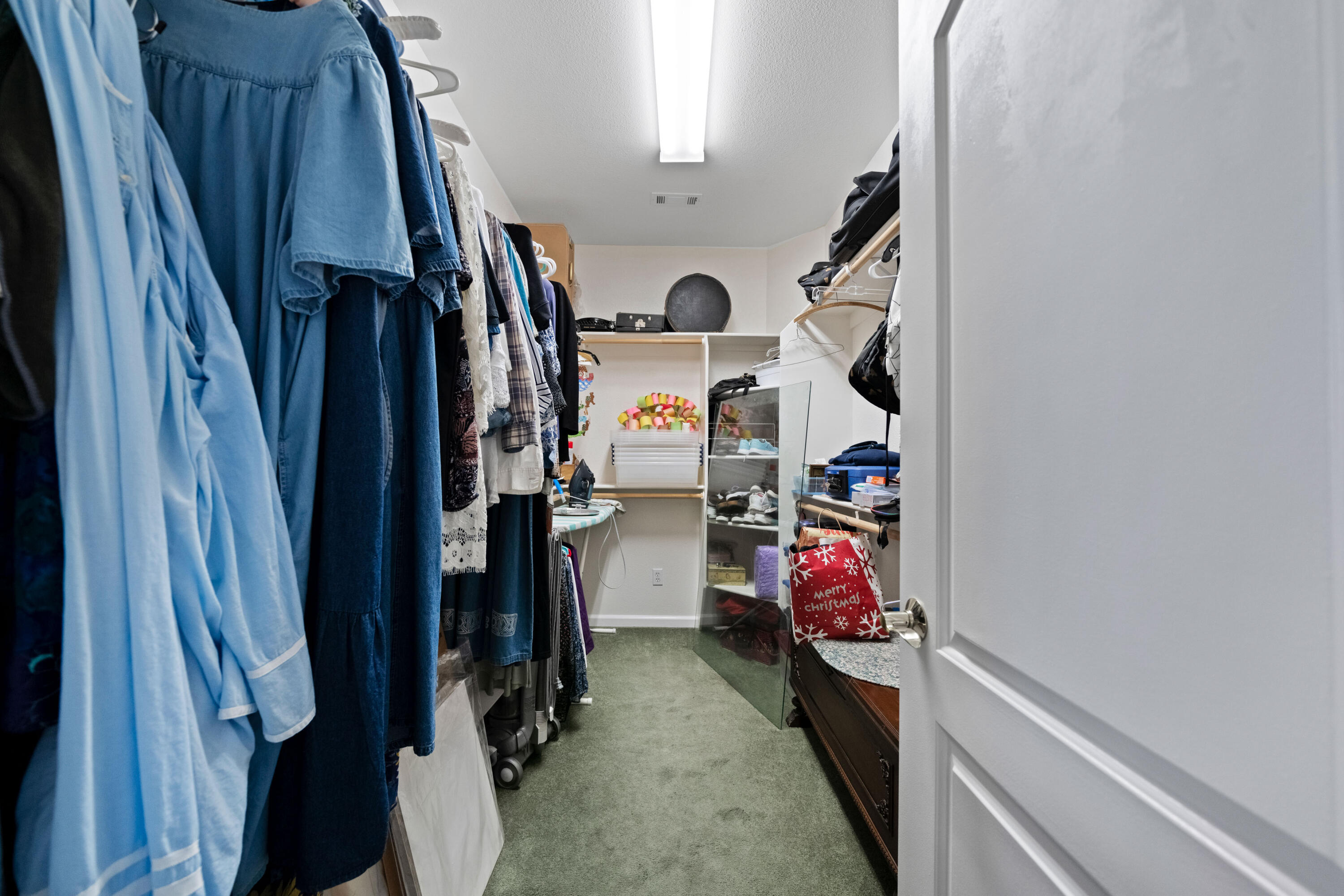 2662 Queens Way Redding, CA 96001 - Photo 11 of 21 a view of walk in closet with clothes