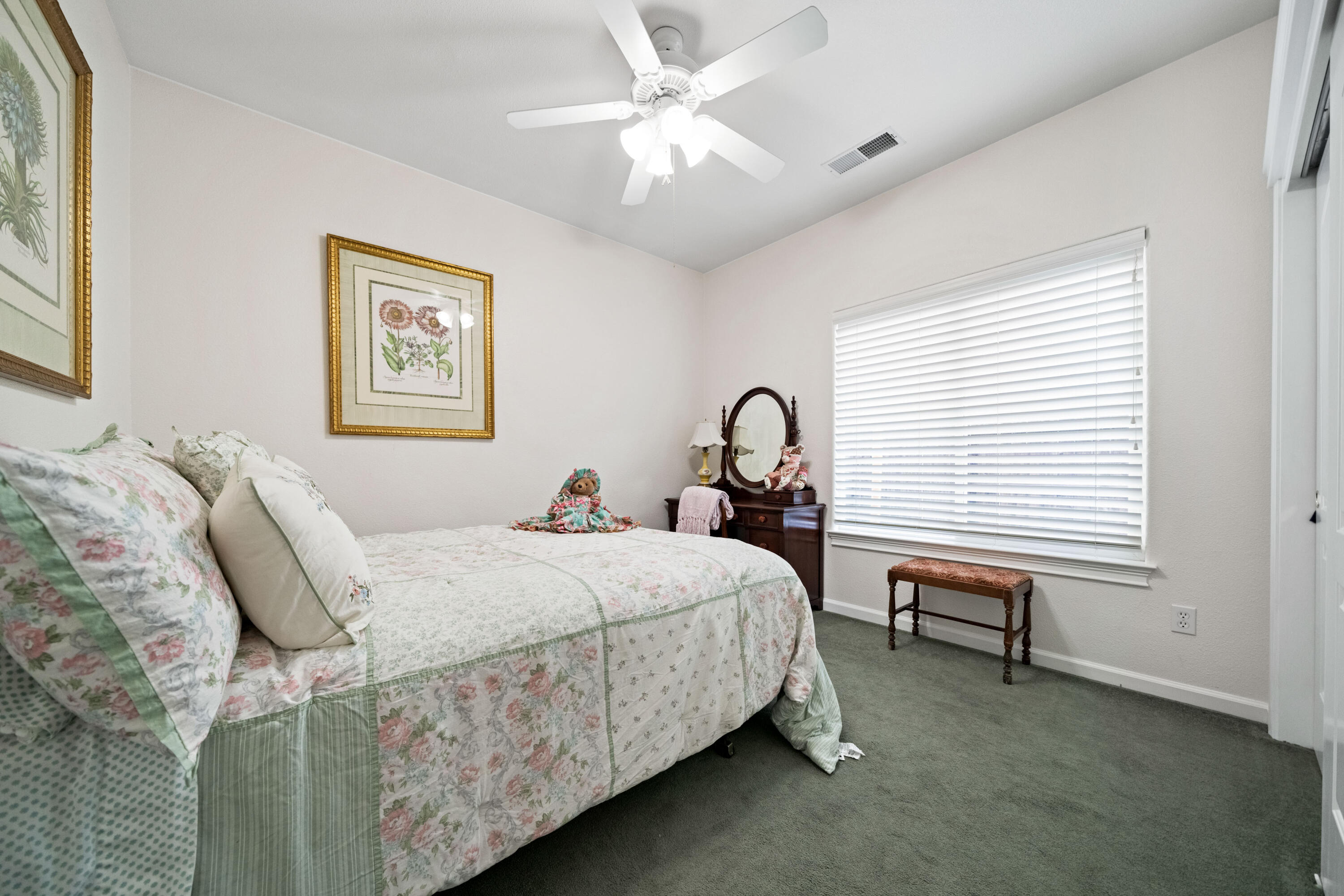 2662 Queens Way Redding, CA 96001 - Photo 12 of 21 a bedroom with a bed and a table