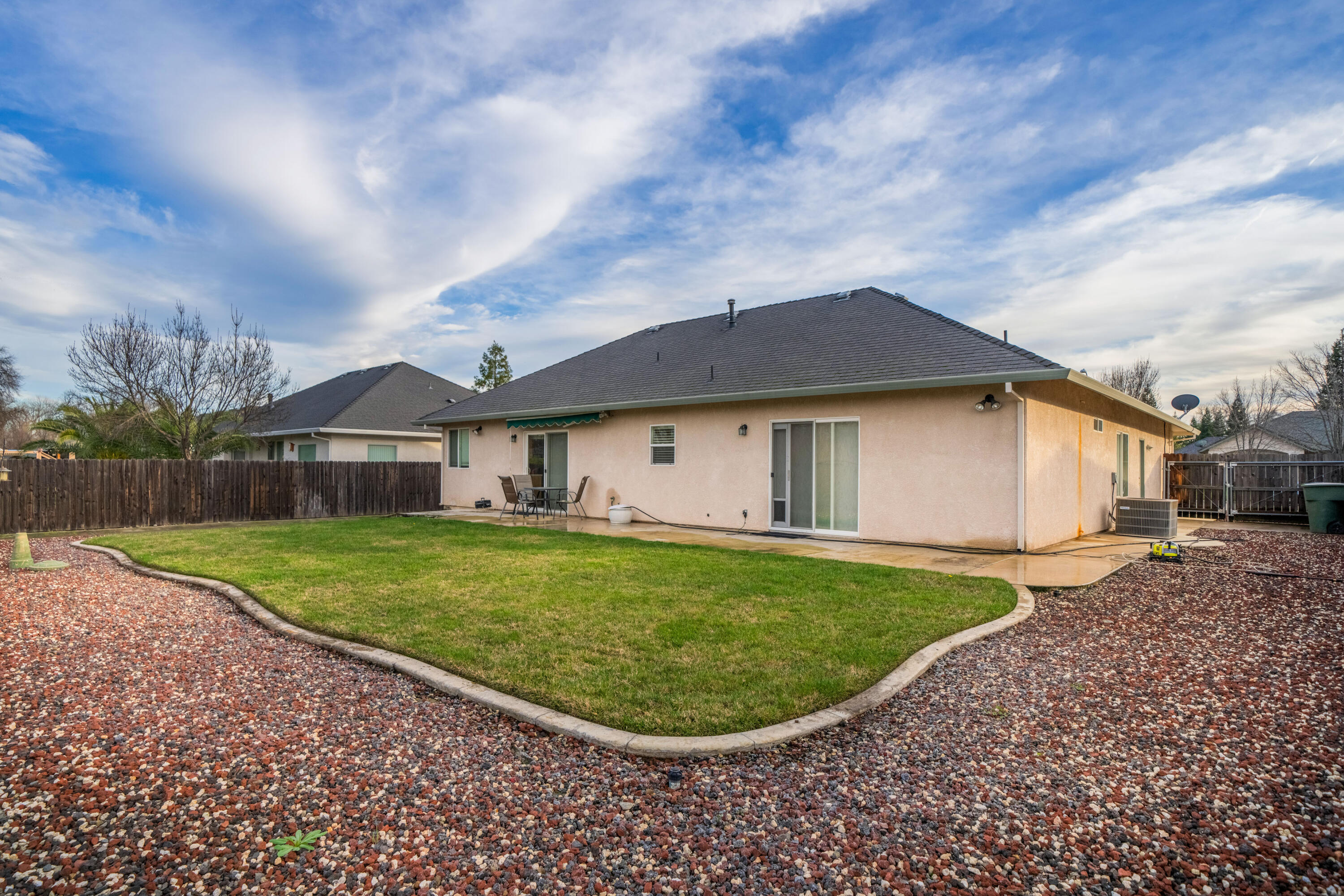 2662 Queens Way Redding, CA 96001 - Photo 16 of 21 a view of a big house with a big yard plants and large trees