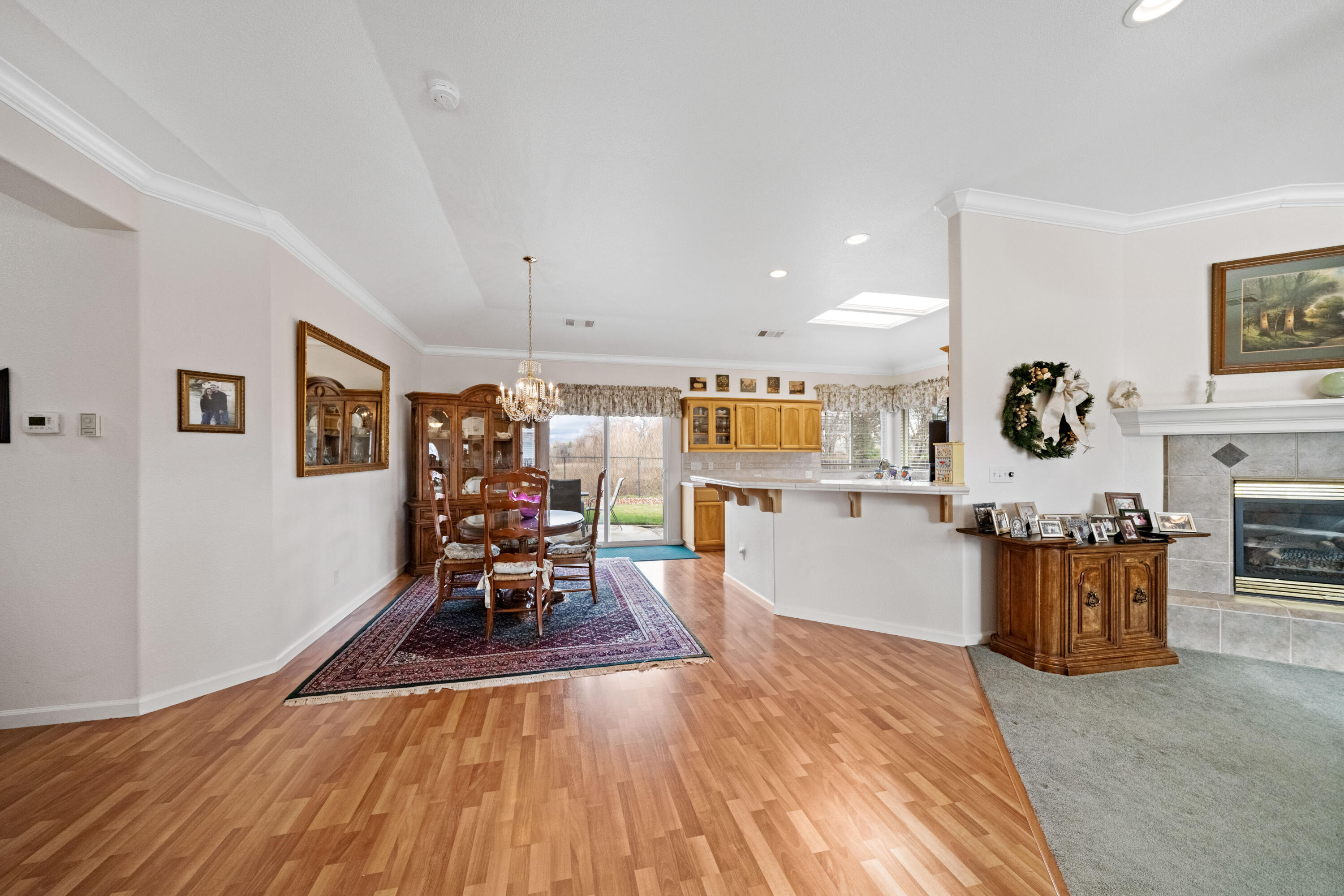2662 Queens Way Redding, CA 96001 - Photo 2 of 21 a living room with furniture and a wooden floor