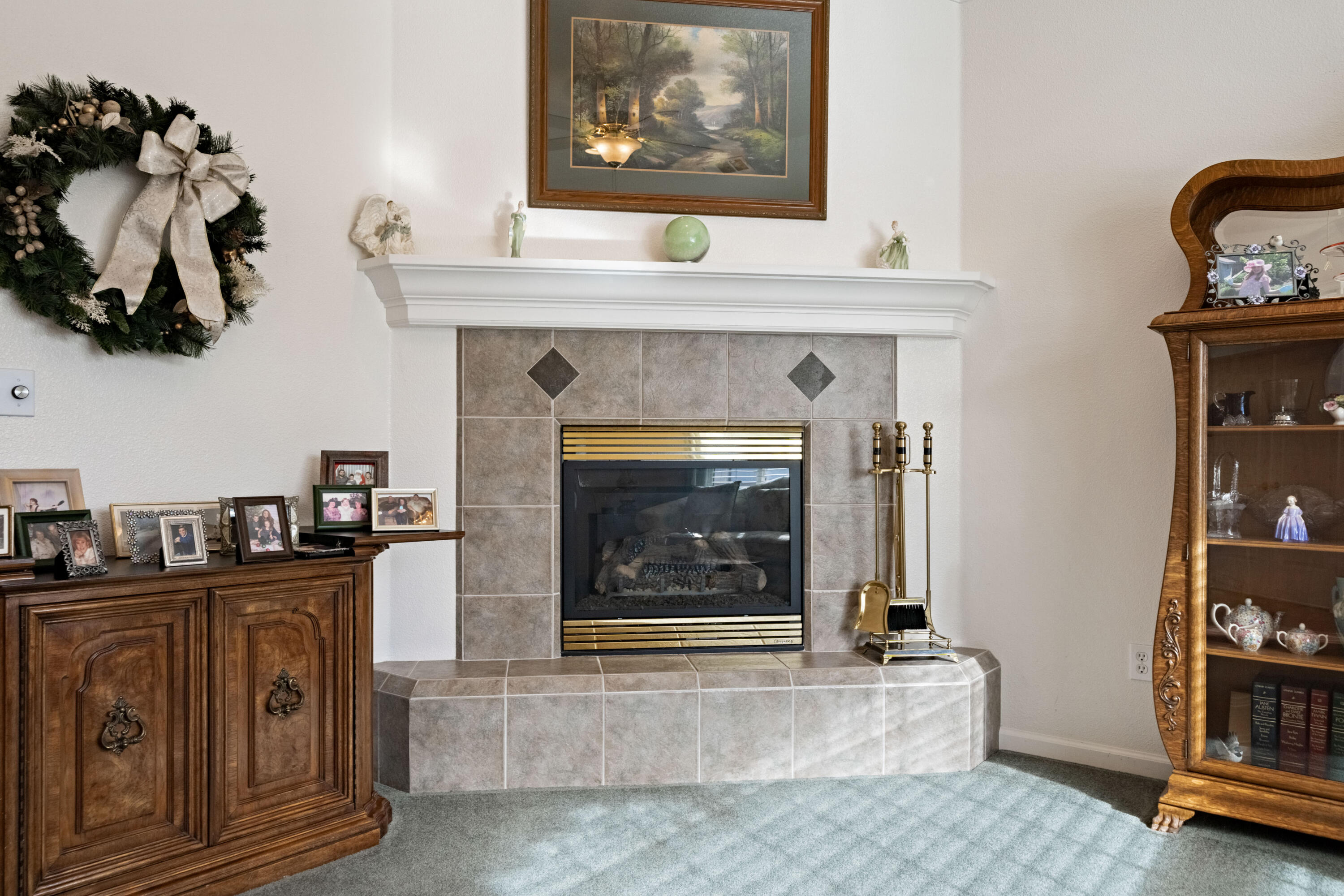 2662 Queens Way Redding, CA 96001 - Photo 7 of 21 a living room with furniture and a fireplace