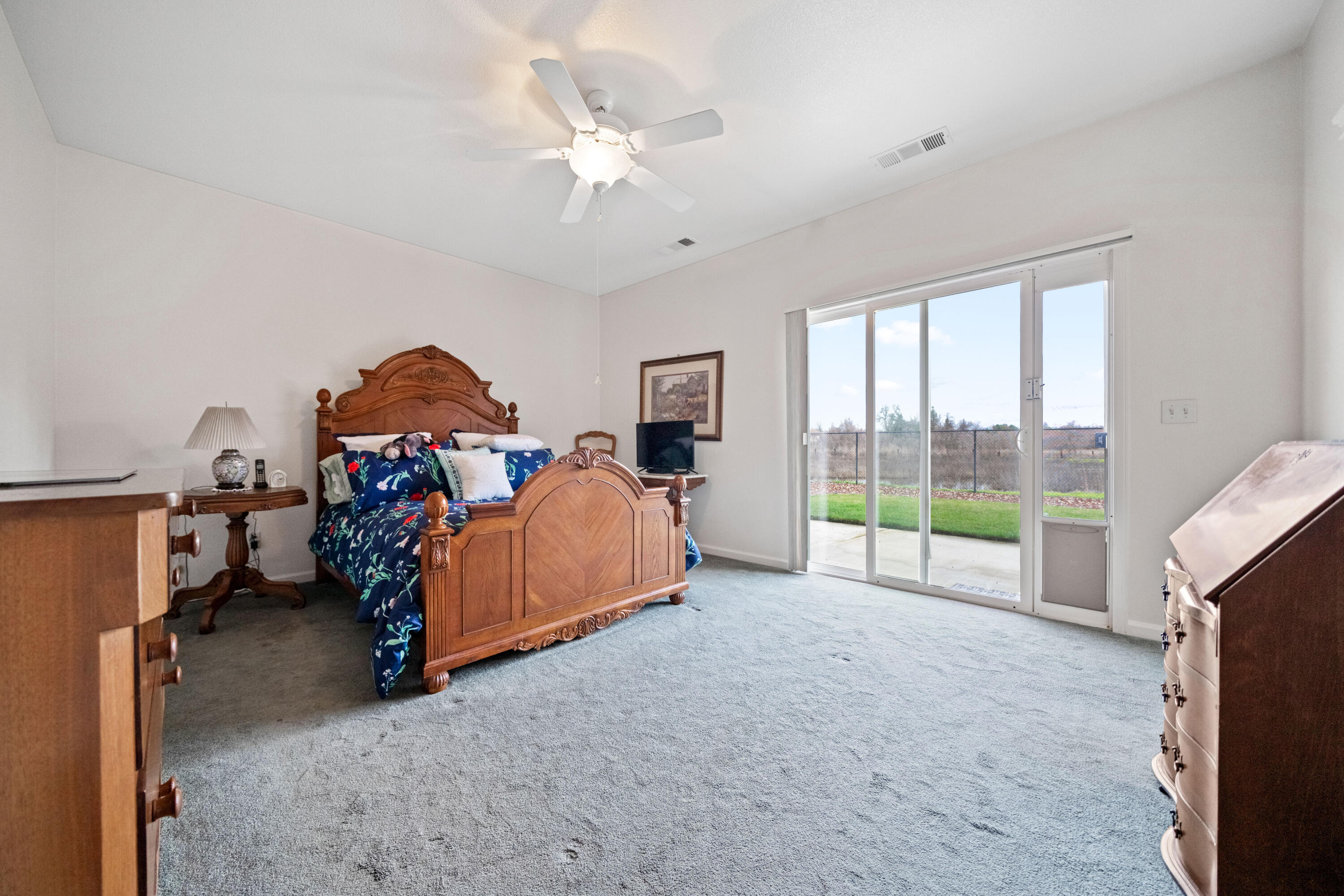 2662 Queens Way Redding, CA 96001 - Photo 9 of 21 a bed room with a bed and a tv