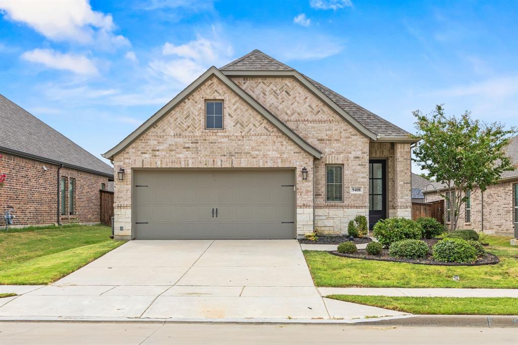 9408 Acorn Lane Oak Point, TX 75068 - Photo 1 of 1 a view of a house with a yard