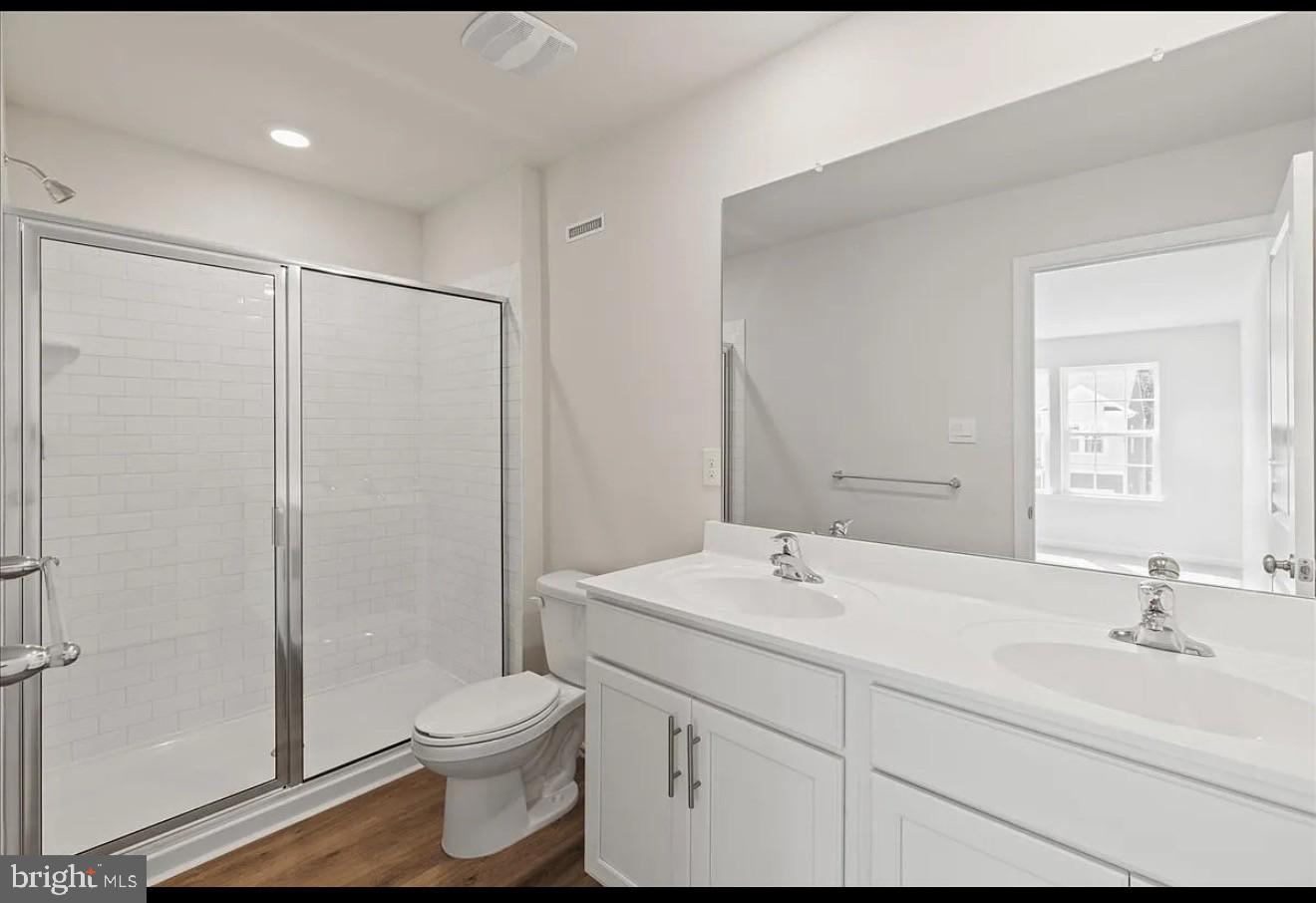 21 Whaler Drive Runnemede, NJ 08078 - Photo 14 of 20 a bathroom with a sink a toilet and shower