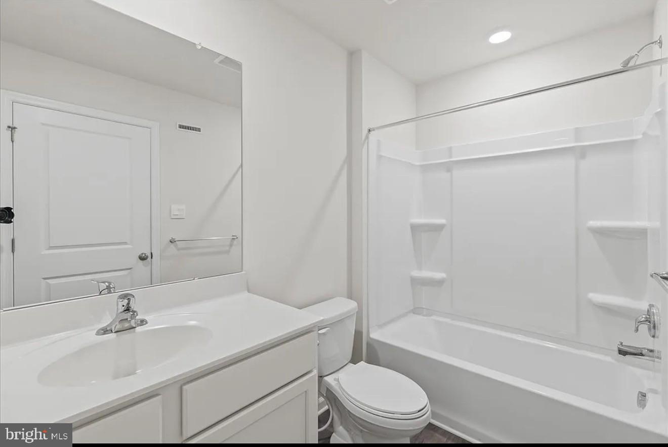 21 Whaler Drive Runnemede, NJ 08078 - Photo 10 of 20 a bathroom with a sink toilet and shower