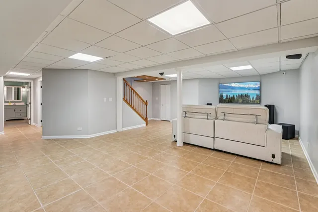 a view of a livingroom with natural light