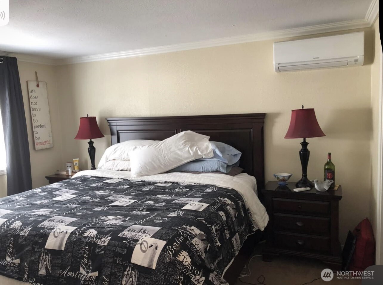 15253 Pine Drive Renton, WA 98058 - Photo 11 of 28 a bedroom with a bed and a lamp