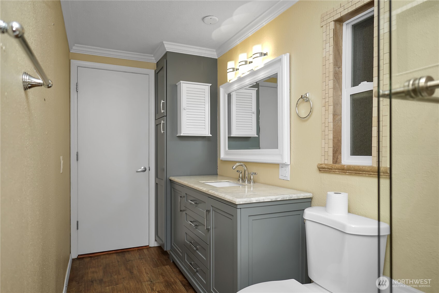 15253 Pine Drive Renton, WA 98058 - Photo 14 of 28 a bathroom with a sink and a mirror