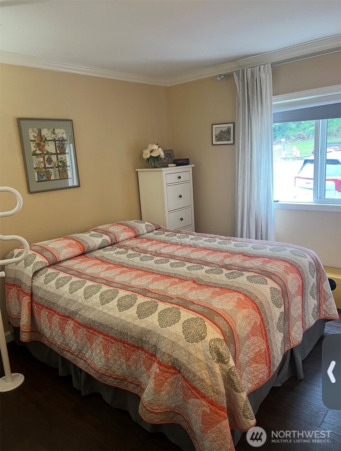 15253 Pine Drive Renton, WA 98058 - Photo 17 of 28 a bedroom with a bed and window