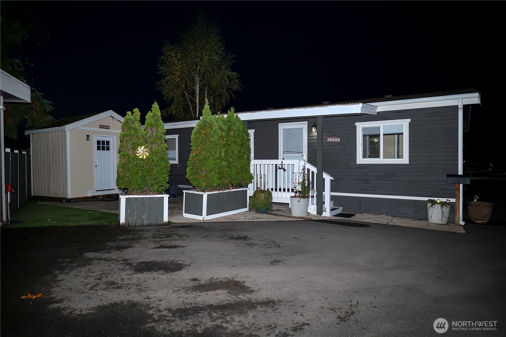 15253 Pine Drive Renton, WA 98058 - Photo 27 of 28 a view of a house with a yard