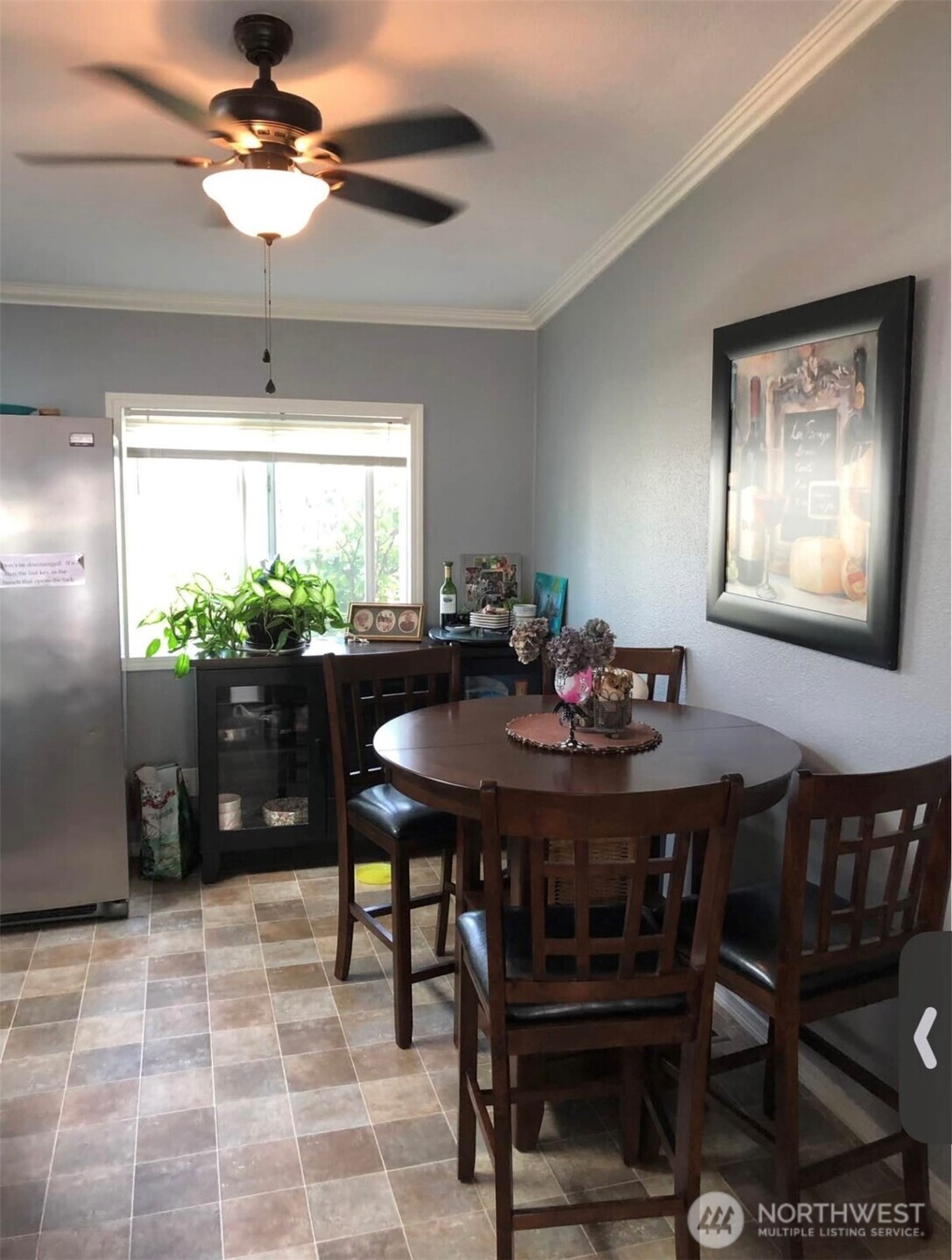 15253 Pine Drive Renton, WA 98058 - Photo 28 of 28 a view of a dining room with furniture