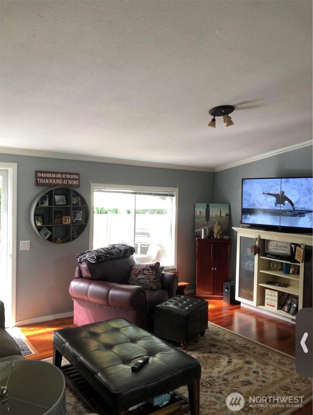15253 Pine Drive Renton, WA 98058 - Photo 4 of 28 a living room with furniture and a fireplace