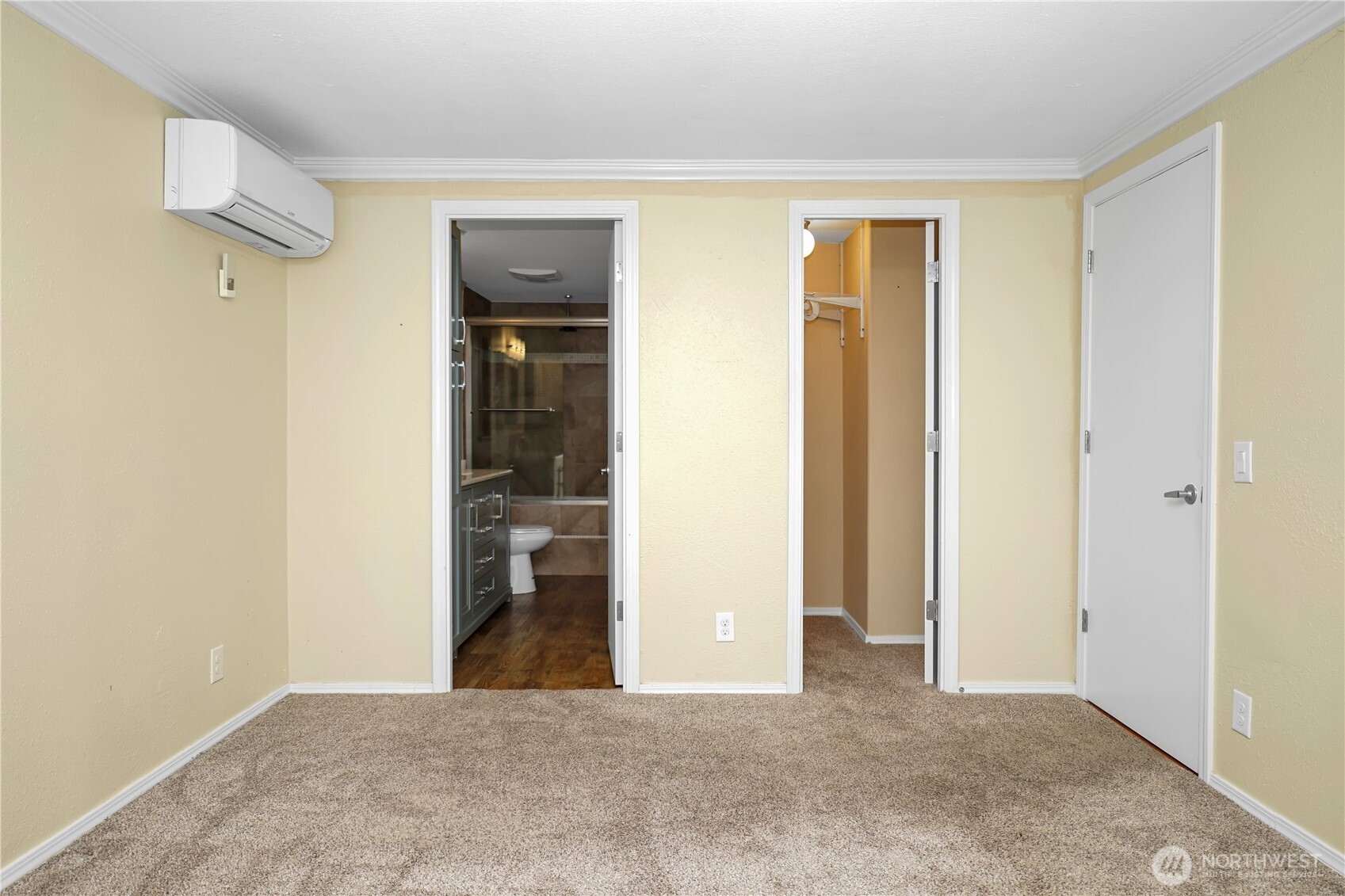 15253 Pine Drive Renton, WA 98058 - Photo 10 of 28 a view of a hallway with wooden shelves