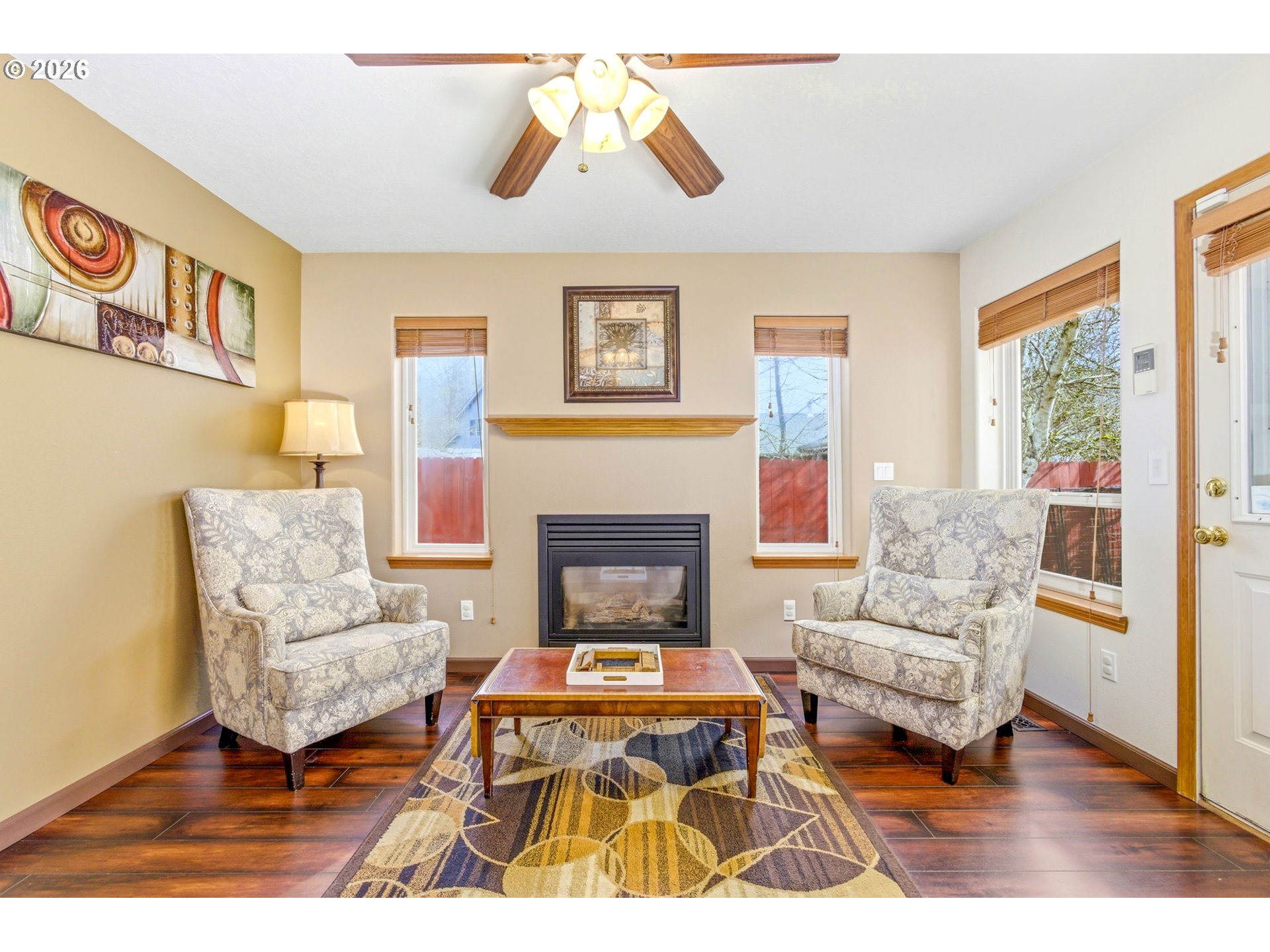 4820 Rebecca Street Northeast Salem, OR 97305 - Photo 19 of 30 a living room with furniture and a fireplace