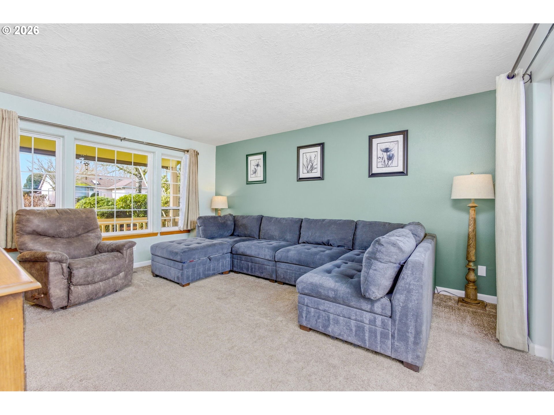 4820 Rebecca Street Northeast Salem, OR 97305 - Photo 6 of 30 a living room with furniture and a large window