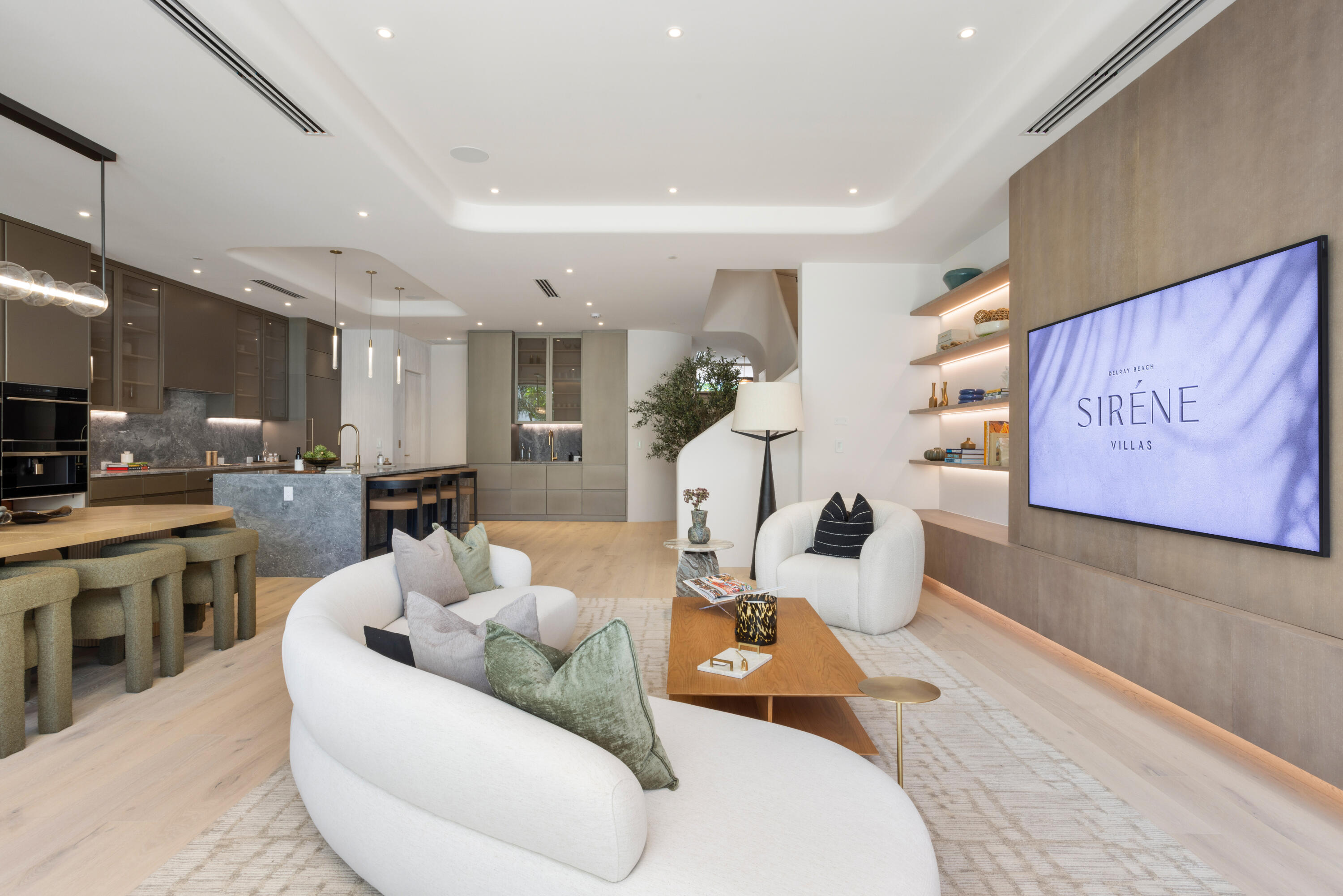 1252 George Bush Boulevard Delray Beach, FL 33483 - Photo 19 of 63 a living room with furniture and kitchen view