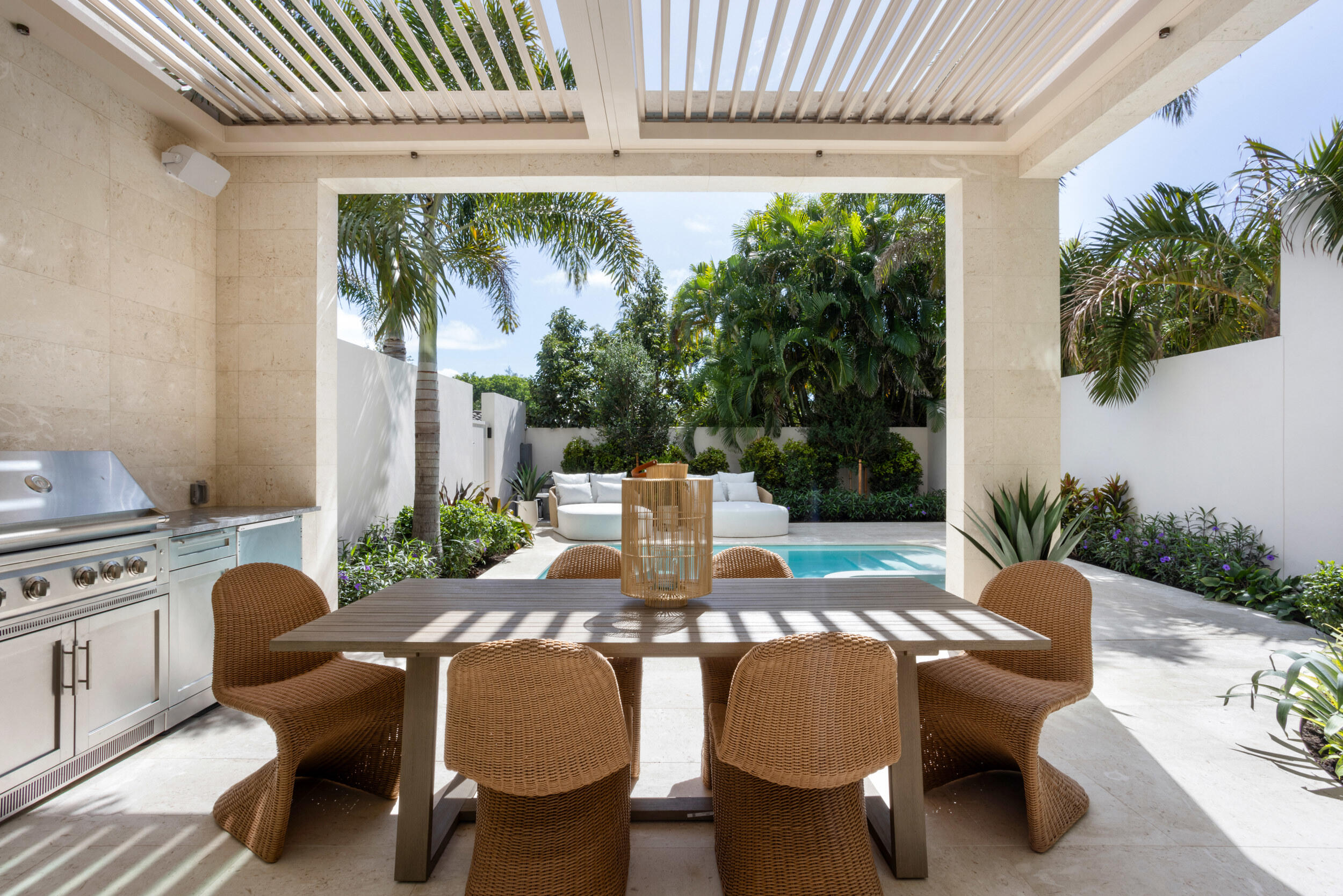 1252 George Bush Boulevard Delray Beach, FL 33483 - Photo 22 of 63 a view of an outdoor dining space with furniture and garden view