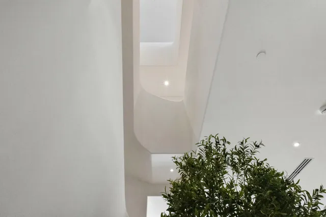 a bathroom with a bathtub sink and mirror